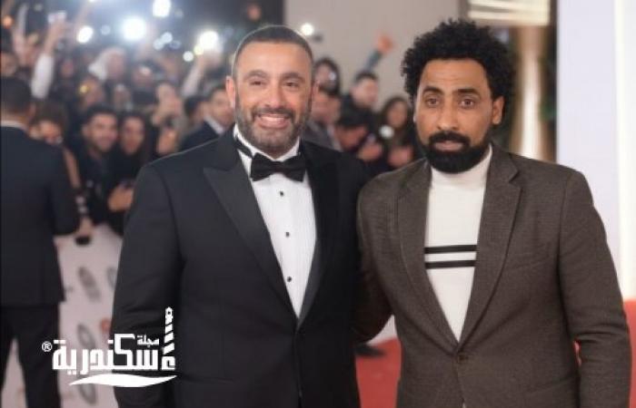 صورة تجمع المخرج أحمد بوجي والفنان أحمد السقا خلال حفل فني
